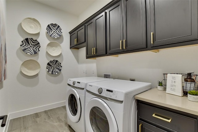 19617 Serenity Ln, Lago Vista, TX 78645 - laundry area with cabinet space and washing machine and clothes dryer