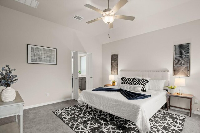 1921 Sauterne Dr, Leander, TX 78641 - carpeted bedroom with ensuite bathroom and ceiling fan
