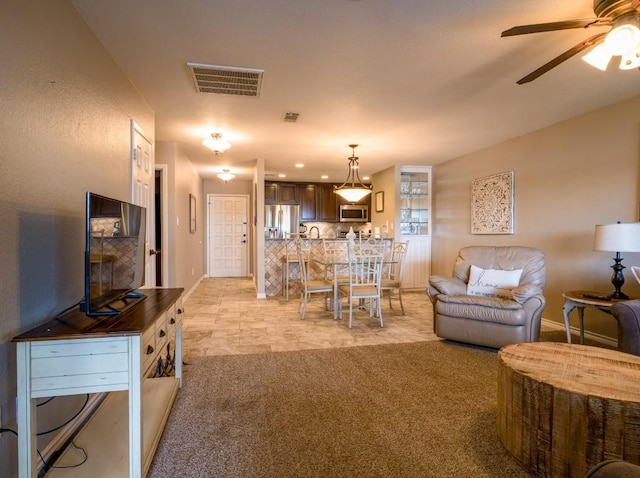 604 Highcrest Dr Unit 722, Granite Shoals, TX 78654 - living room featuring a ceiling fan and light colored carpet