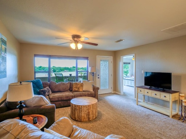 604 Highcrest Dr Unit 722, Granite Shoals, TX 78654 - carpeted living area featuring ceiling fan and plenty of natural light