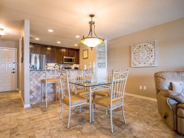 604 Highcrest Dr Unit 722, Granite Shoals, TX 78654 - dining area featuring recessed lighting and baseboards