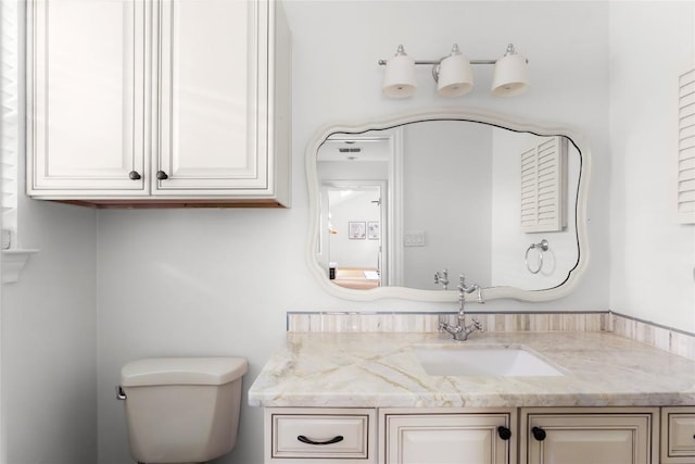 9309 Cedar Forest Dr, Austin, TX 78750 - bathroom featuring vanity and toilet