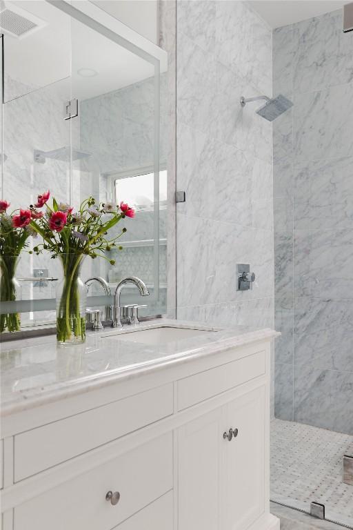 1018 Shelley Ave, Austin, TX 78703 - bathroom with a tile shower and vanity