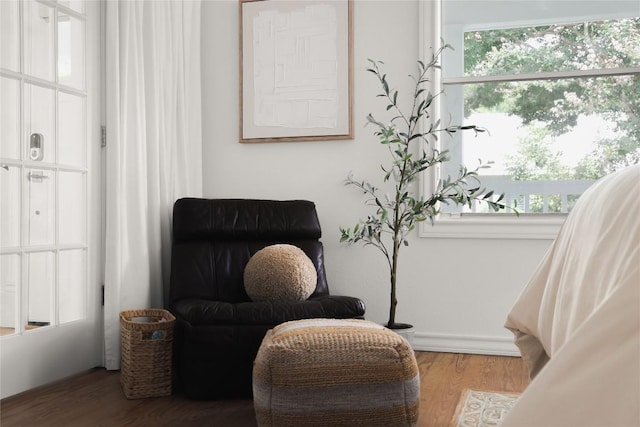 1018 Shelley Ave, Austin, TX 78703 - sitting room featuring healthy amount of natural light and wood finished floors