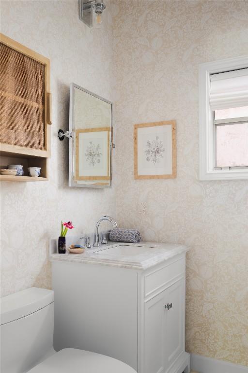 1018 Shelley Ave, Austin, TX 78703 - bathroom featuring wallpapered walls and vanity