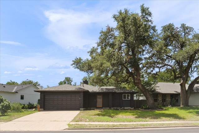 3803 Alexandria Dr, Austin, TX 78749 - ranch-style home featuring an attached garage, driveway, a front yard, and a chimney
