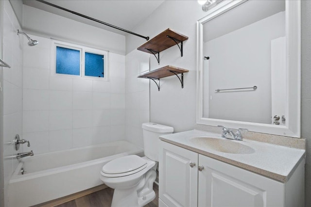 3803 Alexandria Dr, Austin, TX 78749 - bathroom featuring vanity, shower / bath combination, and wood finished floors