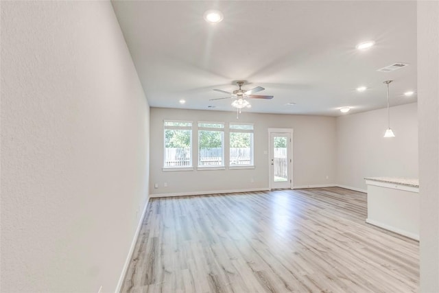 17200C Crane Fly Dr Unit C, Pflugerville, TX 78660 - empty room featuring a ceiling fan, light wood-style flooring, and recessed lighting