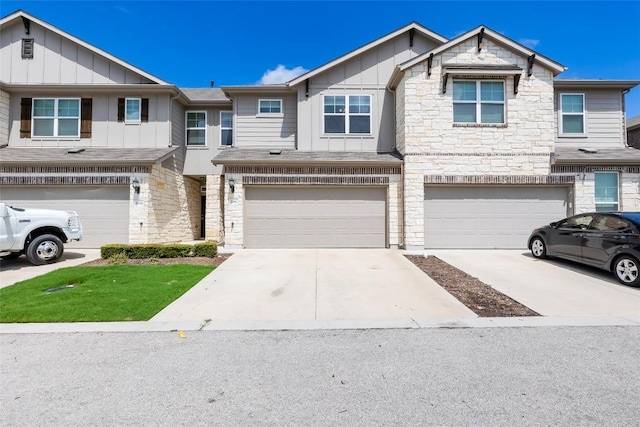 17200C Crane Fly Dr Unit C, Pflugerville, TX 78660 - craftsman-style house with board and batten siding, stone siding, concrete driveway, and a garage