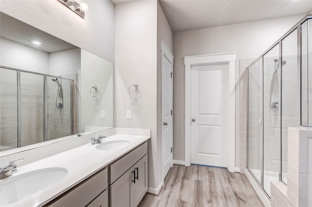 17200C Crane Fly Dr Unit C, Pflugerville, TX 78660 - full bath with a stall shower, wood finished floors, and double vanity