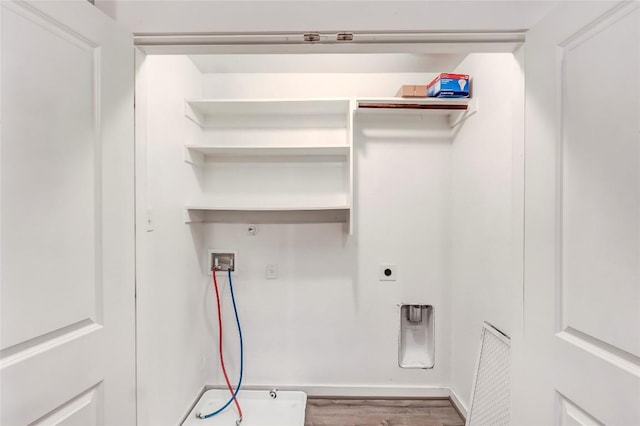 17200C Crane Fly Dr Unit C, Pflugerville, TX 78660 - laundry room with hookup for a washing machine, electric dryer hookup, wood finished floors, and hookup for a gas dryer