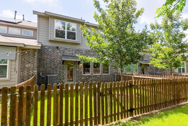 17200C Crane Fly Dr Unit C, Pflugerville, TX 78660 - view of front facade featuring brick siding