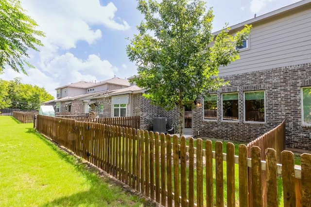 17200C Crane Fly Dr Unit C, Pflugerville, TX 78660 - rear view of property with brick siding