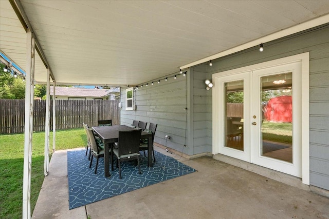 8012 Stillwood Ln, Austin, TX 78757 - view of patio / terrace featuring french doors and outdoor dining area