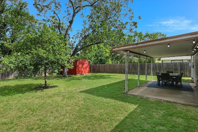 8012 Stillwood Ln, Austin, TX 78757 - fenced backyard with a storage unit and a patio area