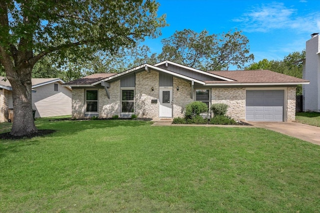 8012 Stillwood Ln, Austin, TX 78757 - view of front of property with driveway, a garage, a front lawn, and stone siding