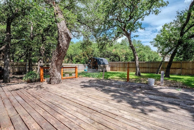 607 County Cork Ln, Leander, TX 78641 - deck with a fenced backyard and a storage unit