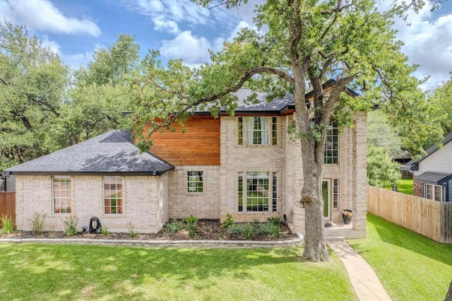 607 County Cork Ln, Leander, TX 78641 - view of front of home with brick siding and a shingled roof