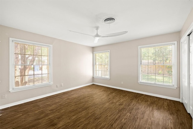 2301 Westworth Cir, Austin, TX 78704 - spare room featuring dark wood finished floors and a ceiling fan