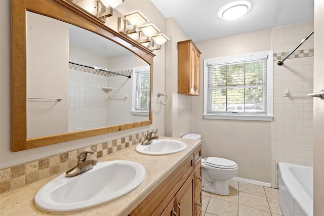 2301 Westworth Cir, Austin, TX 78704 - bathroom with double vanity, tile patterned floors, and tub / shower combination