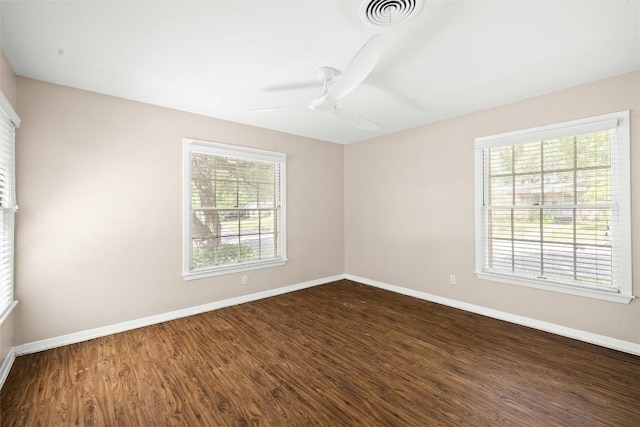 2301 Westworth Cir, Austin, TX 78704 - unfurnished room with dark wood finished floors and ceiling fan