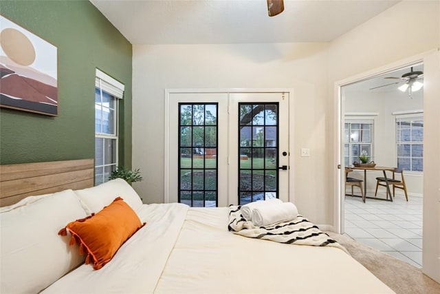 220 Meadow Oaks Dr, Dripping Springs, TX 78620 - tiled bedroom featuring access to exterior and a ceiling fan