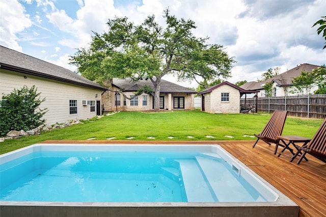 220 Meadow Oaks Dr, Dripping Springs, TX 78620 - view of swimming pool featuring a wooden deck and an outbuilding