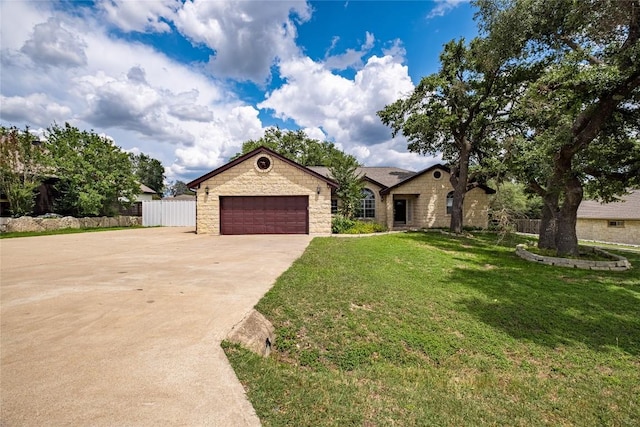 220 Meadow Oaks Dr, Dripping Springs, TX 78620 - view of front of home featuring concrete driveway, stone siding, and a garage