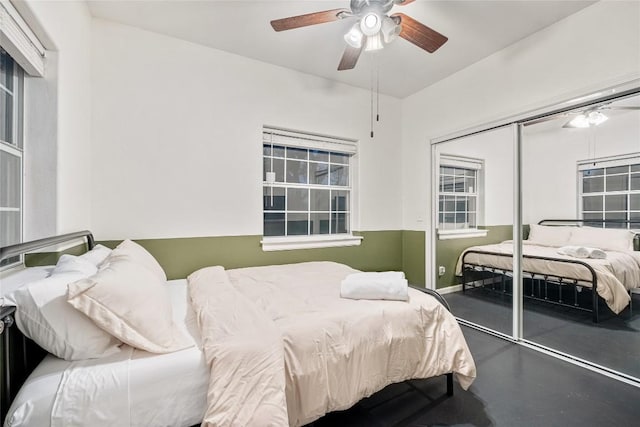 220 Meadow Oaks Dr, Dripping Springs, TX 78620 - bedroom featuring a ceiling fan and a closet