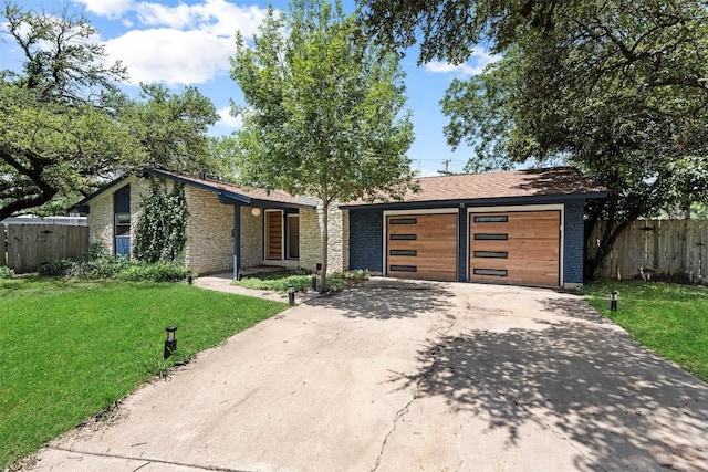 2601 Ashdale Dr, Austin, TX 78757 - view of front of house featuring driveway and brick siding