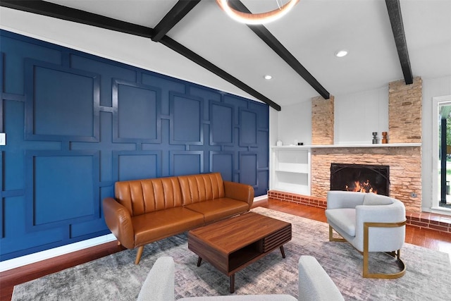 2601 Ashdale Dr, Austin, TX 78757 - living room with wood finished floors and a stone fireplace