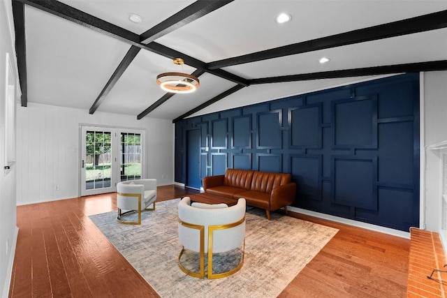 2601 Ashdale Dr, Austin, TX 78757 - living area with a decorative wall and light wood finished floors