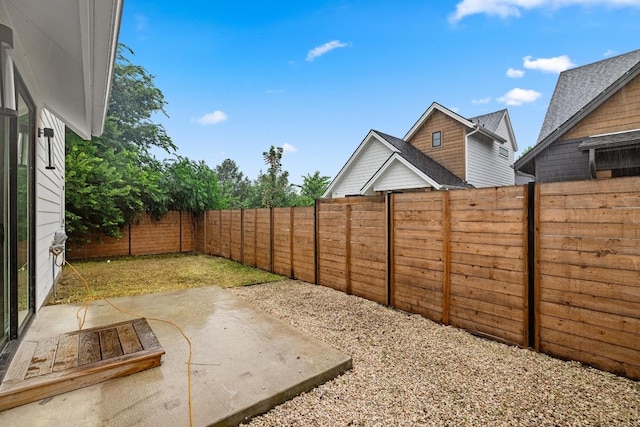 7706 Watson St Unit 2, Austin, TX 78757 - fenced backyard with a patio area