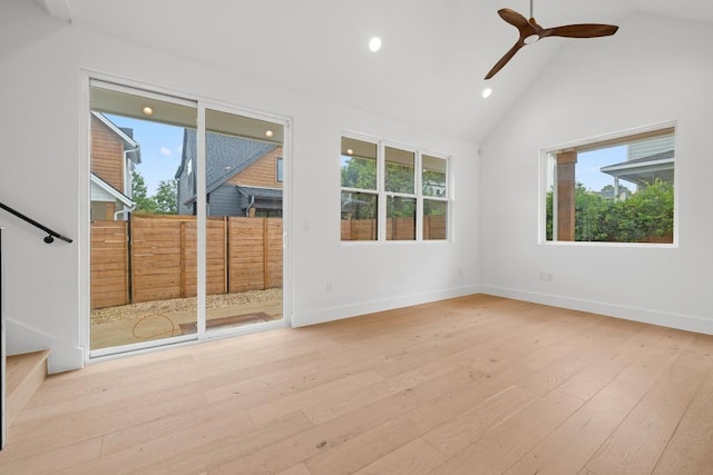 7706 Watson St Unit 2, Austin, TX 78757 - empty room with plenty of natural light, recessed lighting, wood-type flooring, a ceiling fan, and high vaulted ceiling