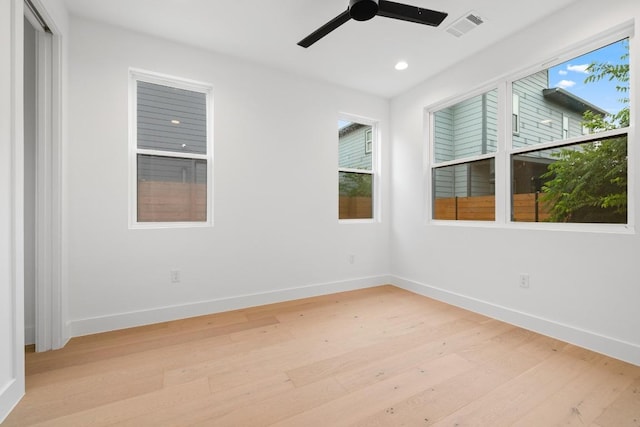 7706 Watson St Unit 2, Austin, TX 78757 - unfurnished room featuring light wood finished floors, ceiling fan, and recessed lighting
