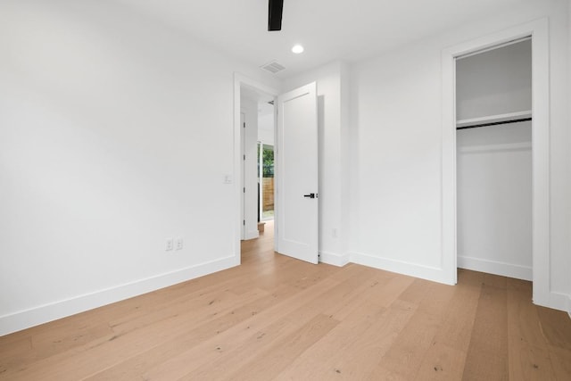 7706 Watson St Unit 2, Austin, TX 78757 - unfurnished bedroom with light wood-style floors, recessed lighting, a closet, and ceiling fan