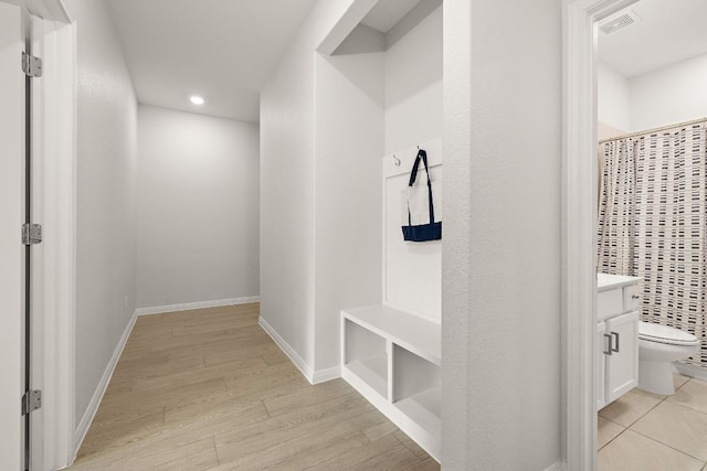 16713 Elsinore Ln, Pflugerville, TX 78660 - mudroom with light wood-style floors and recessed lighting