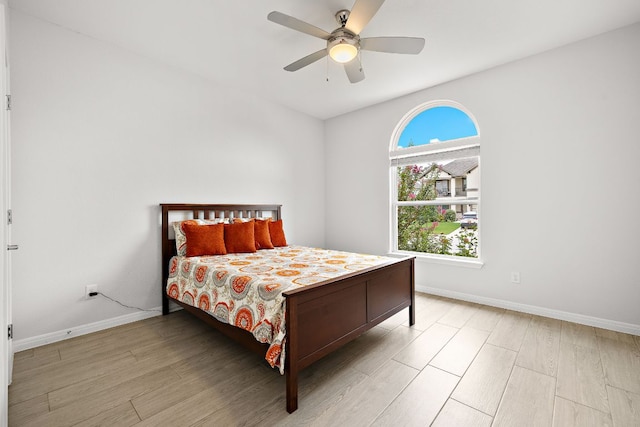 16713 Elsinore Ln, Pflugerville, TX 78660 - bedroom with light wood-style flooring and a ceiling fan
