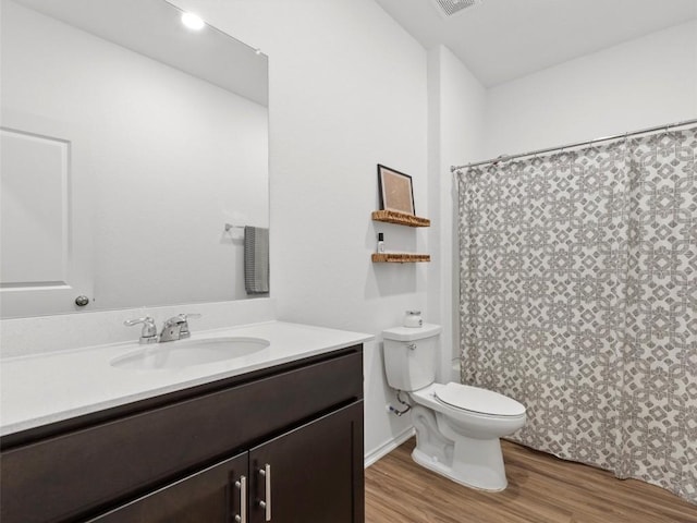 308 Sunfish Ln, Bastrop, TX 78602 - full bath featuring vanity, wood finished floors, and a shower with shower curtain
