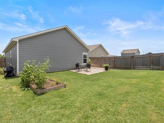 308 Sunfish Ln, Bastrop, TX 78602 - view of yard with a patio area and a garden