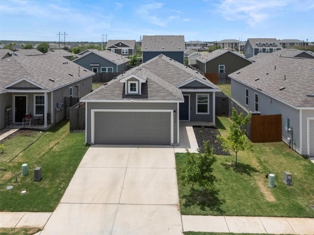 308 Sunfish Ln, Bastrop, TX 78602 - view of front facade featuring a residential view, an attached garage, concrete driveway, and roof with shingles