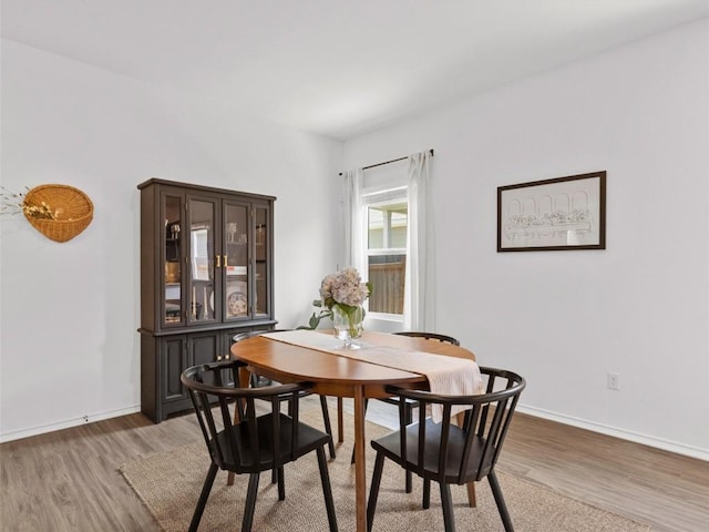 308 Sunfish Ln, Bastrop, TX 78602 - dining space featuring light wood finished floors and baseboards