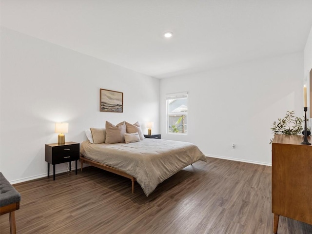 308 Sunfish Ln, Bastrop, TX 78602 - bedroom with wood finished floors and recessed lighting