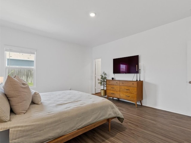 308 Sunfish Ln, Bastrop, TX 78602 - bedroom featuring wood finished floors and recessed lighting