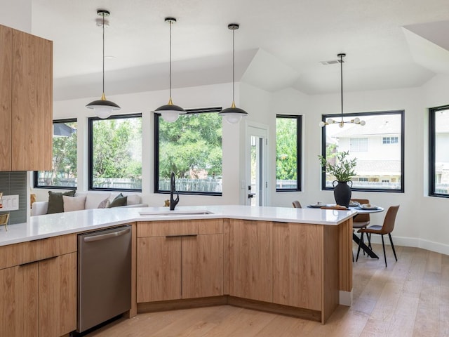 6000 Roxbury Ln, Austin, TX 78739 - kitchen with dishwasher, light countertops, plenty of natural light, light wood finished floors, and lofted ceiling