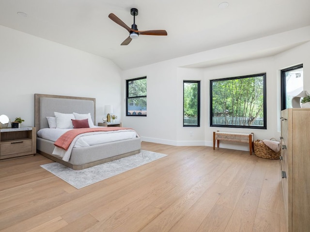 6000 Roxbury Ln, Austin, TX 78739 - bedroom with light wood-type flooring, lofted ceiling, and ceiling fan