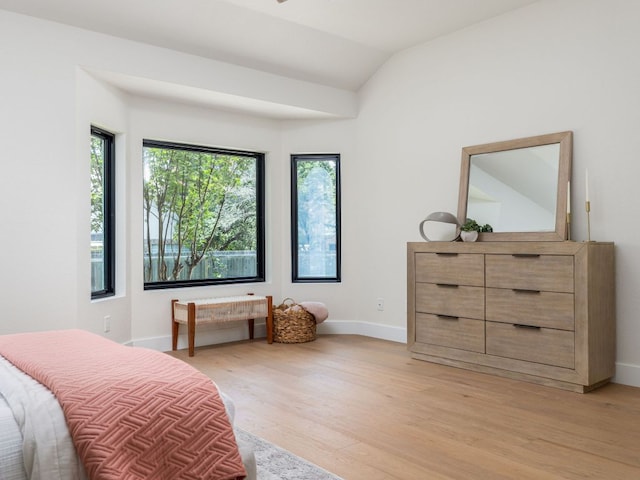 6000 Roxbury Ln, Austin, TX 78739 - bedroom featuring multiple windows, light wood-style flooring, and lofted ceiling