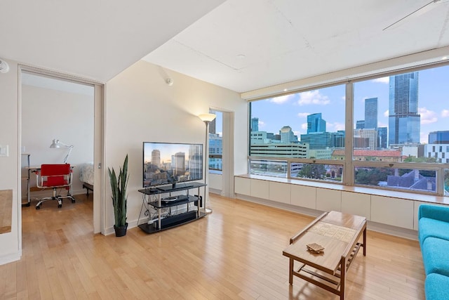 1212 Guadalupe St Unit 805, Austin, TX 78701 - living area featuring light wood-type flooring