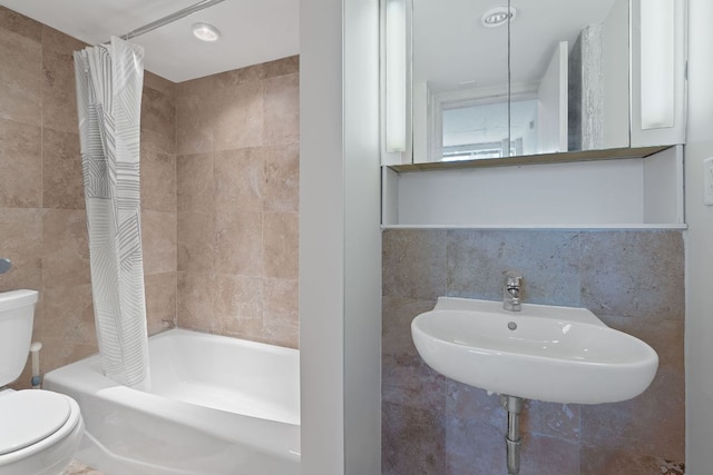 1212 Guadalupe St Unit 805, Austin, TX 78701 - full bathroom featuring tile walls and shower / bath combo