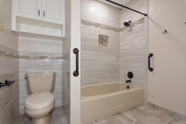 1404 Pearl Cv, Round Rock, TX 78681 - full bathroom featuring shower / bathtub combination, tile patterned flooring, and tile walls